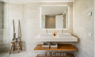 Move-in ready, modern, spacious 4-bedroom apartment for sale with a large private garden in a luxury resort east of Marbella center 787111 