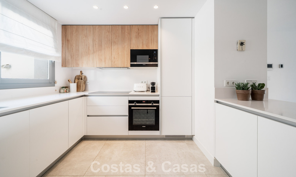 Move-in ready, modern, spacious 4-bedroom apartment for sale with a large private garden in a luxury resort east of Marbella center 787114