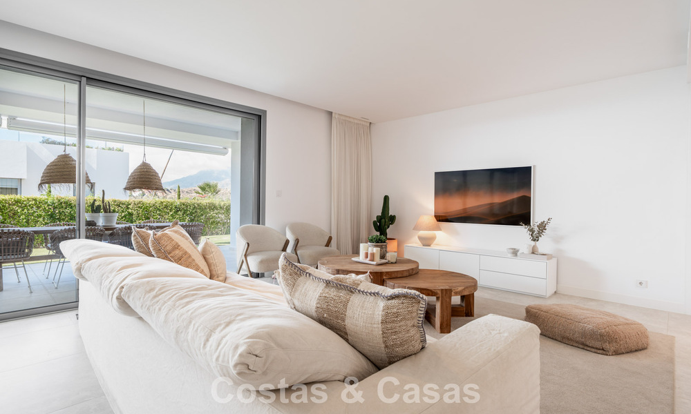 Move-in ready, modern, spacious 4-bedroom apartment for sale with a large private garden in a luxury resort east of Marbella center 787115