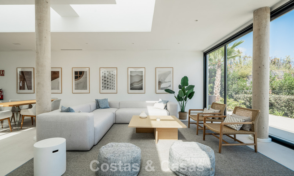 Move-in ready, modern, spacious 4-bedroom apartment for sale with a large private garden in a luxury resort east of Marbella center 787117