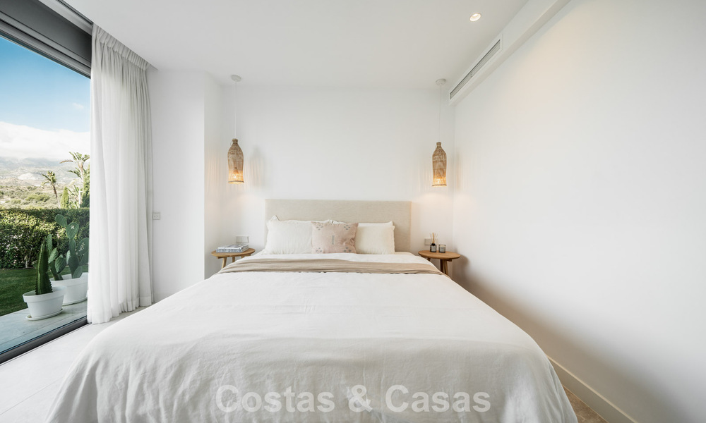 Move-in ready, modern, spacious 4-bedroom apartment for sale with a large private garden in a luxury resort east of Marbella center 787118