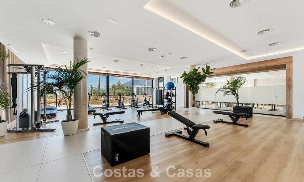 Move-in ready, modern, spacious 4-bedroom apartment for sale with a large private garden in a luxury resort east of Marbella center 797845