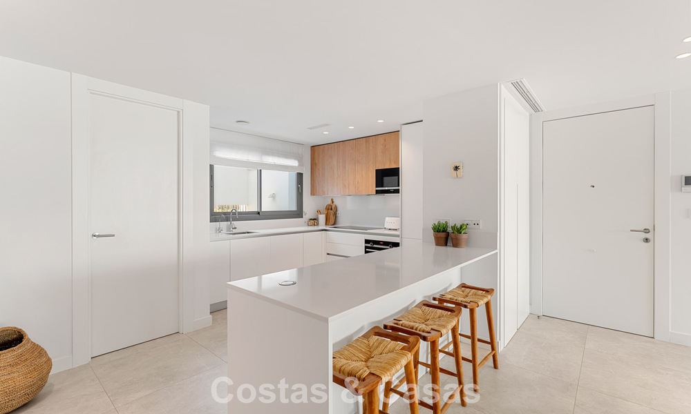 Move-in ready, modern, spacious 4-bedroom apartment for sale with a large private garden in a luxury resort east of Marbella center 797855