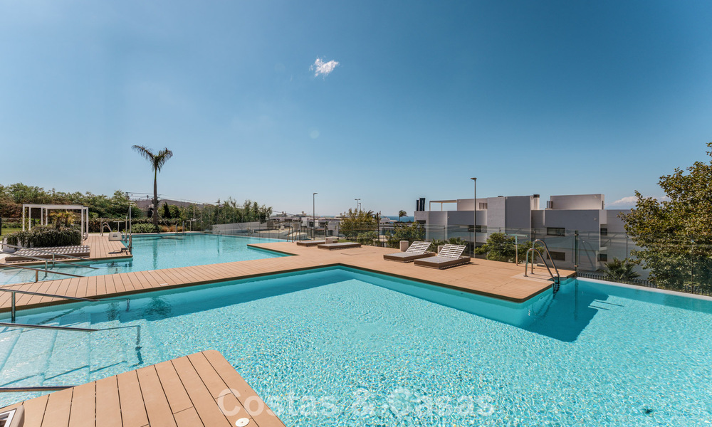 Move-in ready, modern, spacious 4-bedroom apartment for sale with a large private garden in a luxury resort east of Marbella center 797864