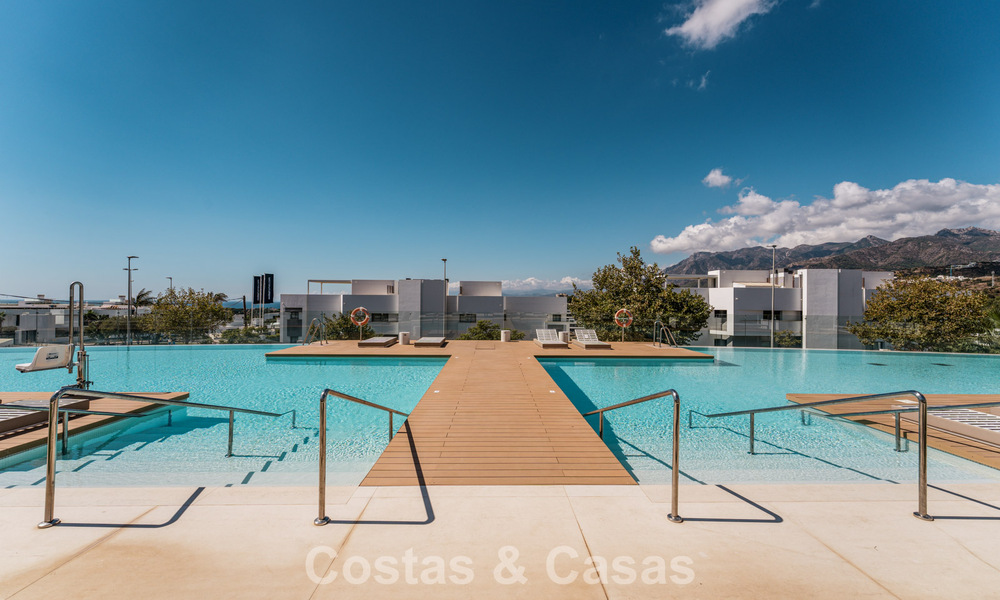 Move-in ready, modern, spacious 4-bedroom apartment for sale with a large private garden in a luxury resort east of Marbella center 797865