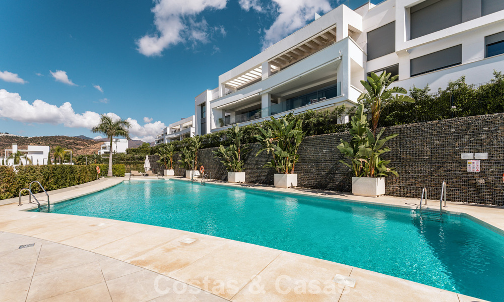 Move-in ready, modern, spacious 4-bedroom apartment for sale with a large private garden in a luxury resort east of Marbella center 797866