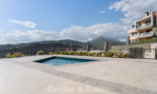 Move-in ready apartment with modern architecture for sale in a golf resort in the hills of Marbella - Benahavis 787122 