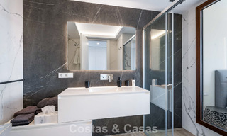 Move-in ready apartment with modern architecture for sale in a golf resort in the hills of Marbella - Benahavis 787124 