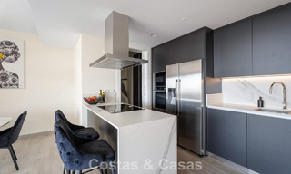 Move-in ready apartment with modern architecture for sale in a golf resort in the hills of Marbella - Benahavis 787129 