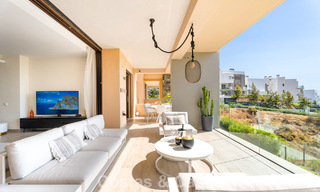 Move-in ready apartment with modern architecture for sale in a golf resort in the hills of Marbella - Benahavis 787133 