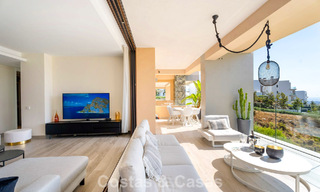 Move-in ready apartment with modern architecture for sale in a golf resort in the hills of Marbella - Benahavis 787147 