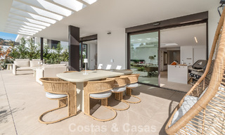 Modern semi-detached house for sale in a golf complex east of Marbella Center 787936 