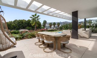 Modern semi-detached house for sale in a golf complex east of Marbella Center 787943 