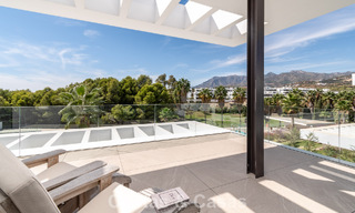 Modern semi-detached house for sale in a golf complex east of Marbella Center 787956 