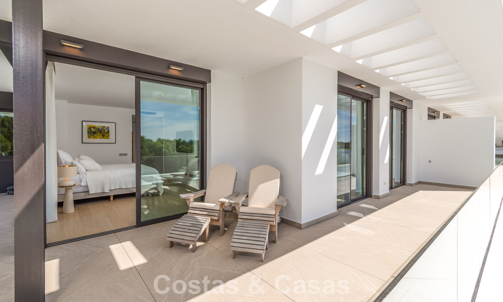 Modern semi-detached house for sale in a golf complex east of Marbella Center 787957