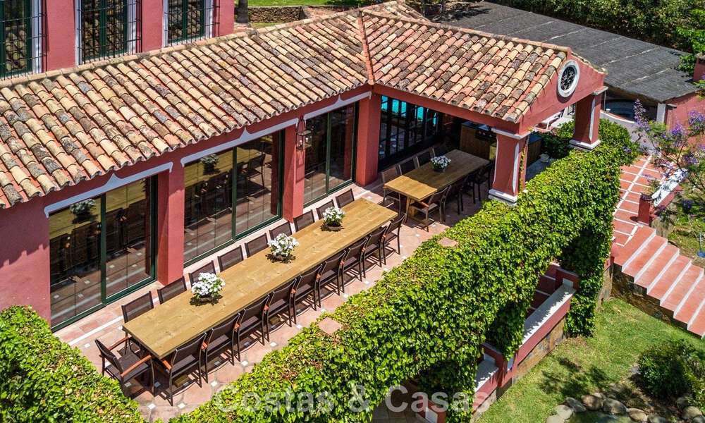 Stately luxury villa for sale in a classic Andalusian style in a gated, prestigious urbanization in Benahavis - Marbella 787971