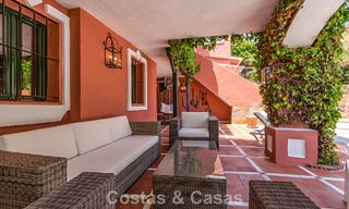 Stately luxury villa for sale in a classic Andalusian style in a gated, prestigious urbanization in Benahavis - Marbella 787977 