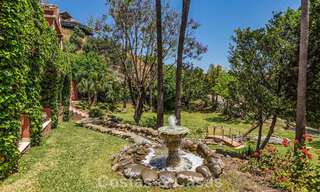 Stately luxury villa for sale in a classic Andalusian style in a gated, prestigious urbanization in Benahavis - Marbella 787978 