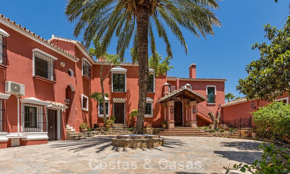 Stately luxury villa for sale in a classic Andalusian style in a gated, prestigious urbanization in Benahavis - Marbella 787981