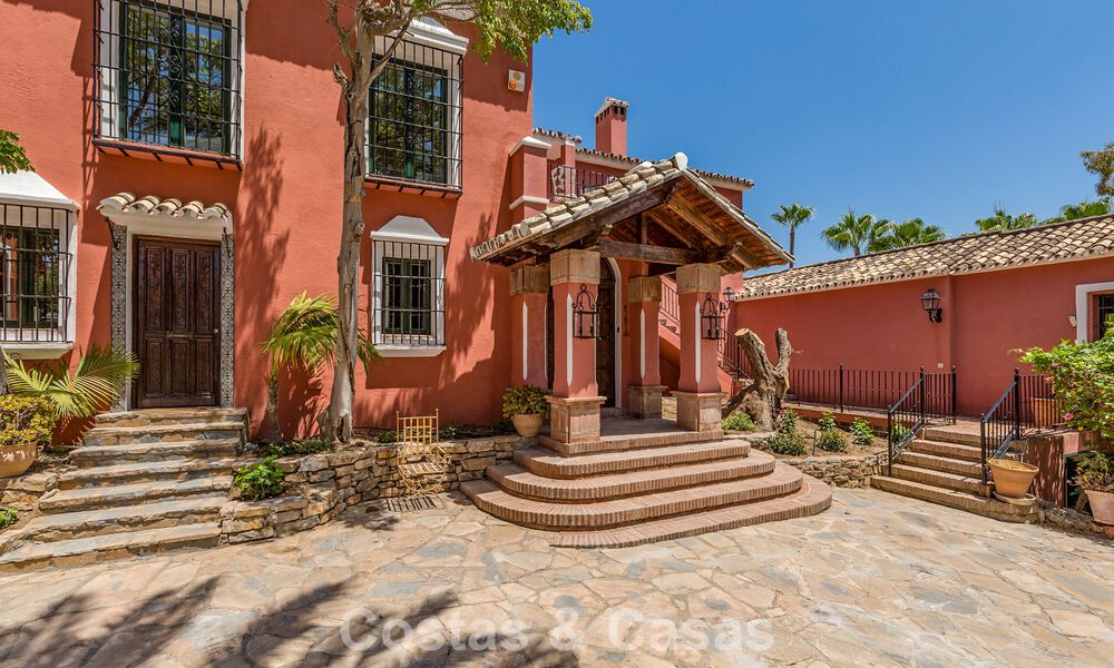 Stately luxury villa for sale in a classic Andalusian style in a gated, prestigious urbanization in Benahavis - Marbella 787982