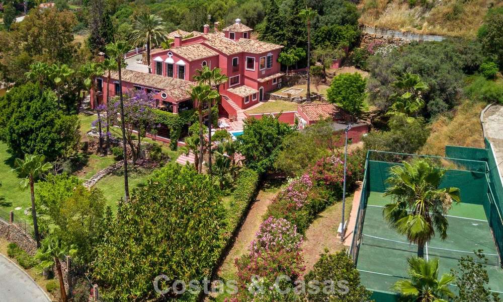 Stately luxury villa for sale in a classic Andalusian style in a gated, prestigious urbanization in Benahavis - Marbella 787983