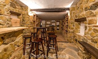 Stately luxury villa for sale in a classic Andalusian style in a gated, prestigious urbanization in Benahavis - Marbella 787985 