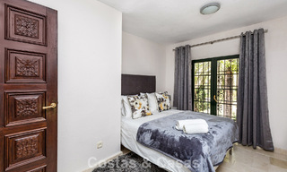 Stately luxury villa for sale in a classic Andalusian style in a gated, prestigious urbanization in Benahavis - Marbella 787986 