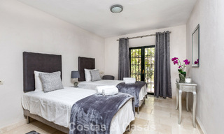 Stately luxury villa for sale in a classic Andalusian style in a gated, prestigious urbanization in Benahavis - Marbella 787987 