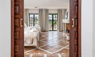 Stately luxury villa for sale in a classic Andalusian style in a gated, prestigious urbanization in Benahavis - Marbella 787990 