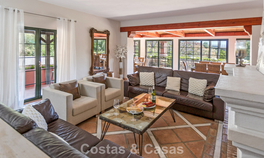 Stately luxury villa for sale in a classic Andalusian style in a gated, prestigious urbanization in Benahavis - Marbella 787993