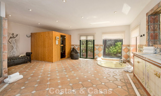 Stately luxury villa for sale in a classic Andalusian style in a gated, prestigious urbanization in Benahavis - Marbella 787996 