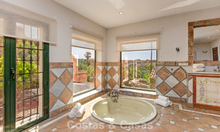 Stately luxury villa for sale in a classic Andalusian style in a gated, prestigious urbanization in Benahavis - Marbella 787997 