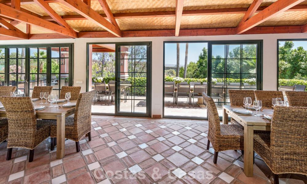 Stately luxury villa for sale in a classic Andalusian style in a gated, prestigious urbanization in Benahavis - Marbella 787998