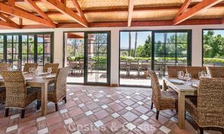 Stately luxury villa for sale in a classic Andalusian style in a gated, prestigious urbanization in Benahavis - Marbella 787998 