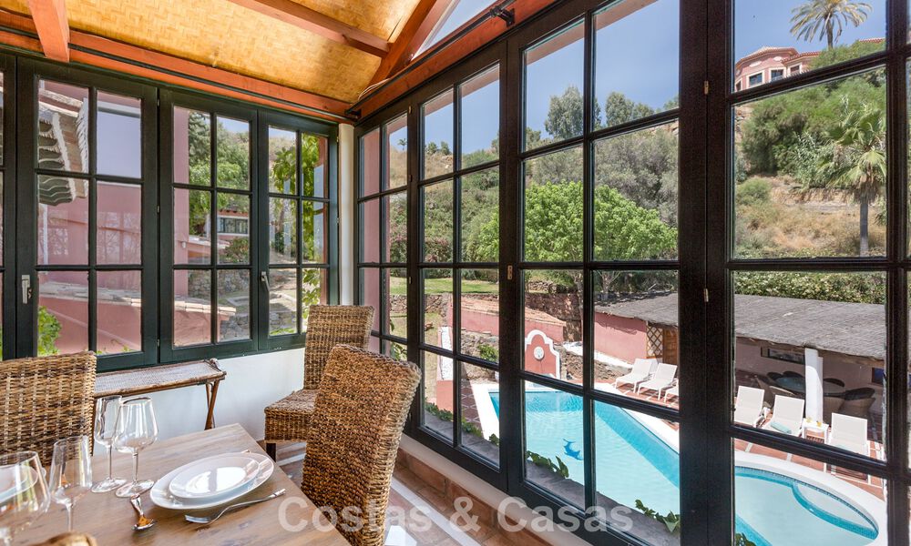 Stately luxury villa for sale in a classic Andalusian style in a gated, prestigious urbanization in Benahavis - Marbella 788001