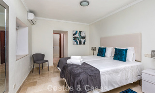 Stately luxury villa for sale in a classic Andalusian style in a gated, prestigious urbanization in Benahavis - Marbella 788002 