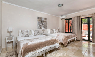 Stately luxury villa for sale in a classic Andalusian style in a gated, prestigious urbanization in Benahavis - Marbella 788006 