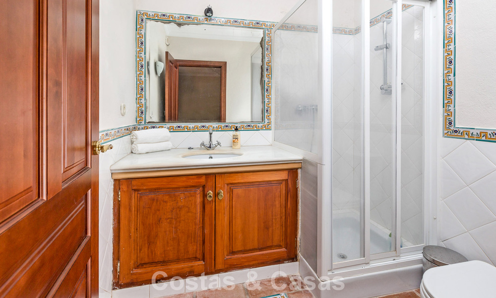 Stately luxury villa for sale in a classic Andalusian style in a gated, prestigious urbanization in Benahavis - Marbella 788008