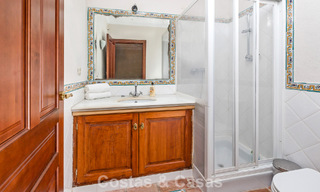 Stately luxury villa for sale in a classic Andalusian style in a gated, prestigious urbanization in Benahavis - Marbella 788008 