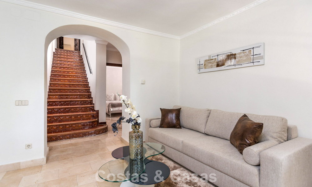 Stately luxury villa for sale in a classic Andalusian style in a gated, prestigious urbanization in Benahavis - Marbella 788009