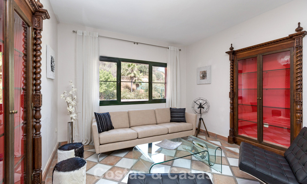 Stately luxury villa for sale in a classic Andalusian style in a gated, prestigious urbanization in Benahavis - Marbella 788012