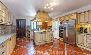 Stately luxury villa for sale in a classic Andalusian style in a gated, prestigious urbanization in Benahavis - Marbella 788013 