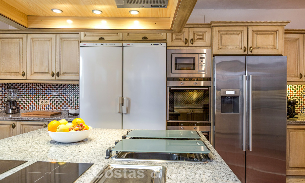 Stately luxury villa for sale in a classic Andalusian style in a gated, prestigious urbanization in Benahavis - Marbella 788014