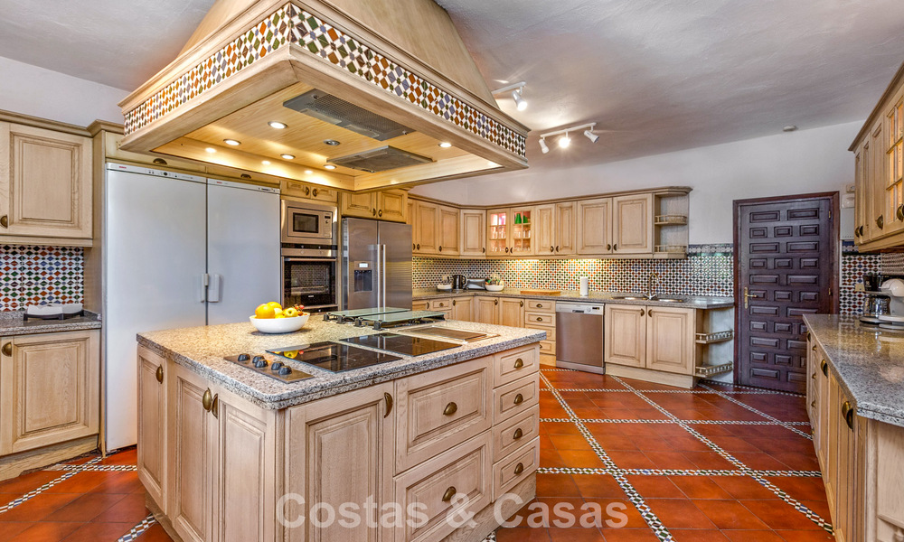 Stately luxury villa for sale in a classic Andalusian style in a gated, prestigious urbanization in Benahavis - Marbella 788015