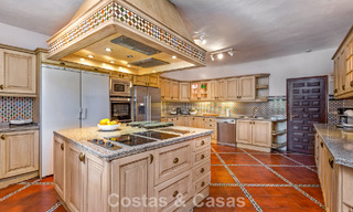 Stately luxury villa for sale in a classic Andalusian style in a gated, prestigious urbanization in Benahavis - Marbella 788015 