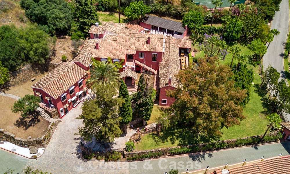 Stately luxury villa for sale in a classic Andalusian style in a gated, prestigious urbanization in Benahavis - Marbella 788017
