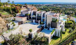 High-end luxury villa with panoramic sea views for sale in a prestigious resort, Benahavis - Marbella 788388 
