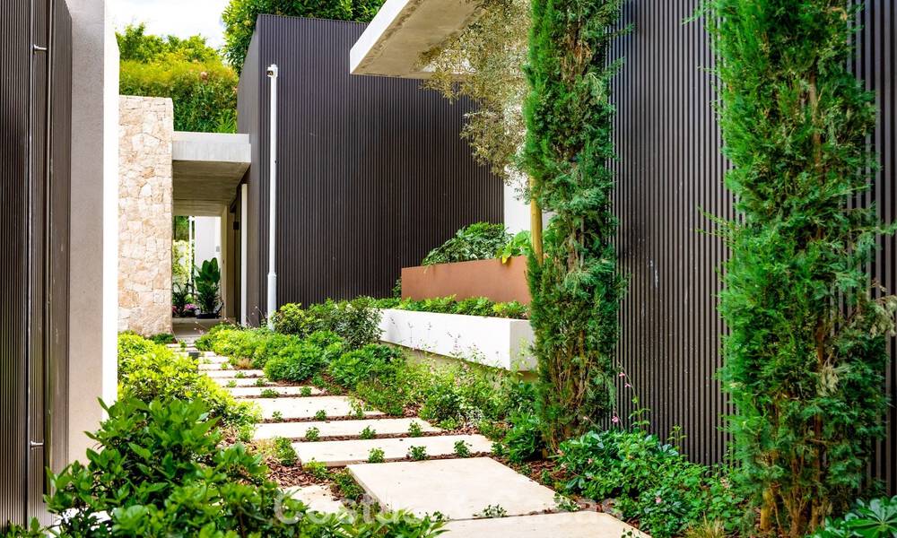 High-end luxury villa with panoramic sea views for sale in a prestigious resort, Benahavis - Marbella 788395