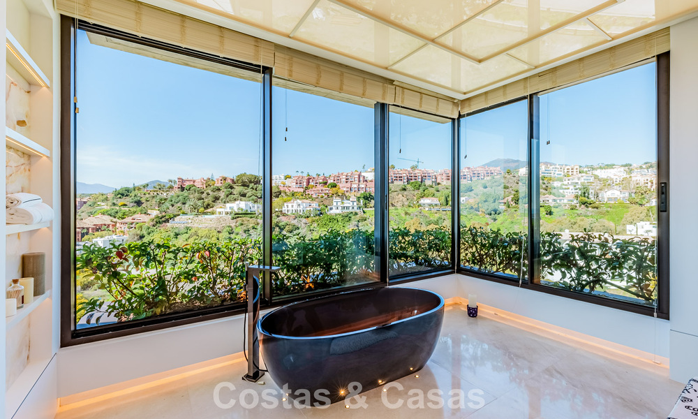 High-end luxury villa with panoramic sea views for sale in a prestigious resort, Benahavis - Marbella 788400