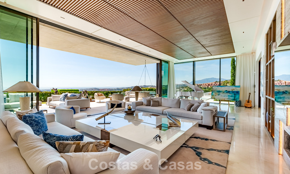 High-end luxury villa with panoramic sea views for sale in a prestigious resort, Benahavis - Marbella 788406